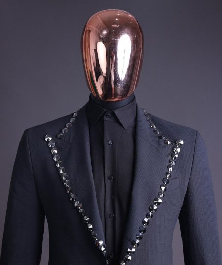 A steel black, seer sucker fabric, knitted, peak lapel suit