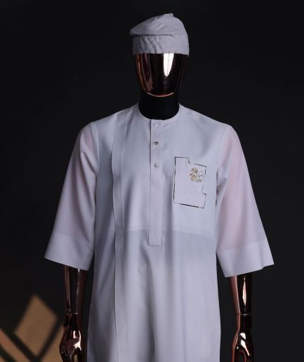 A White, curved and square shaped pocket with floral embrodery details, 3/4 sleeve African senator kaftan native.