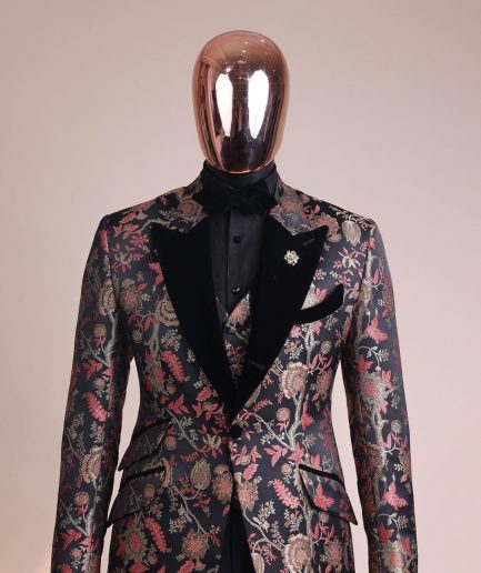 A Gold, peach and black mix metallic jacquard, peak lapel tuxedo suit