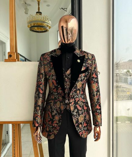 A Gold, peach and black mix metallic jacquard, peak lapel tuxedo suit