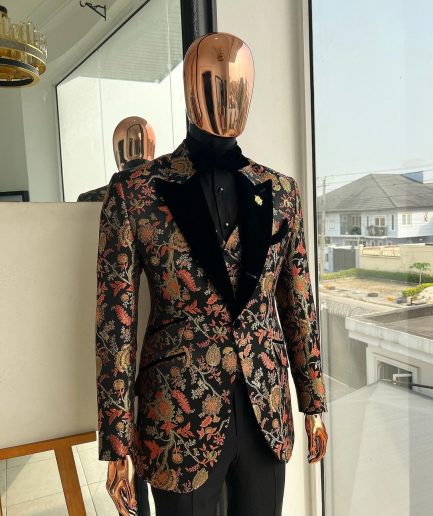 A Gold, peach and black mix metallic jacquard, peak lapel tuxedo suit
