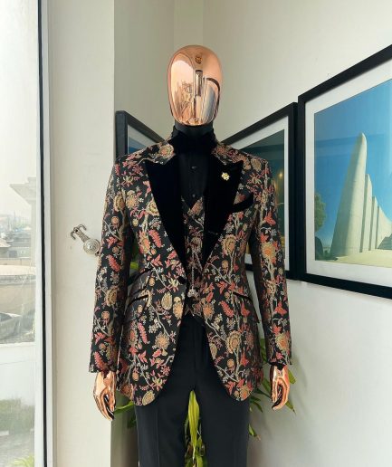 A Gold, peach and black mix metallic jacquard, peak lapel tuxedo suit