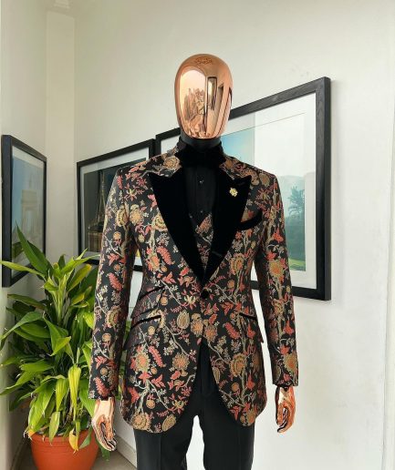 A Gold, peach and black mix metallic jacquard, peak lapel tuxedo suit