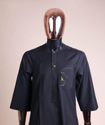 A charcoal black, inverted and closed flap shaped pocket details, 3/4 sleeve African senator kaftan native.