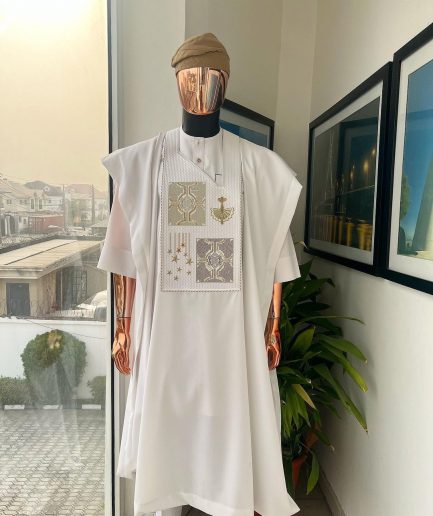 A white, dripping stars and interconnected maze embroidery details agbada