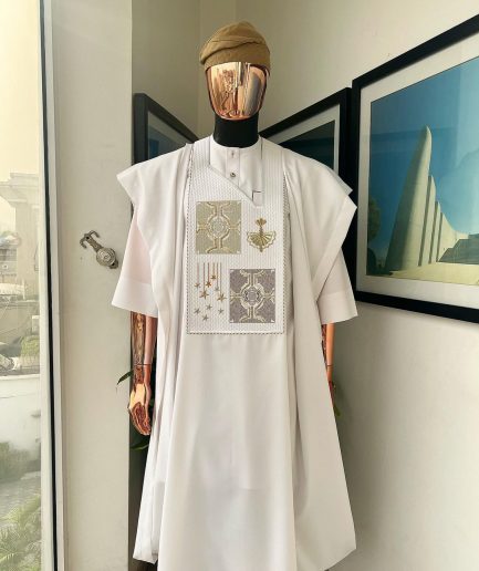 A white, dripping stars and interconnected maze embroidery details agbada