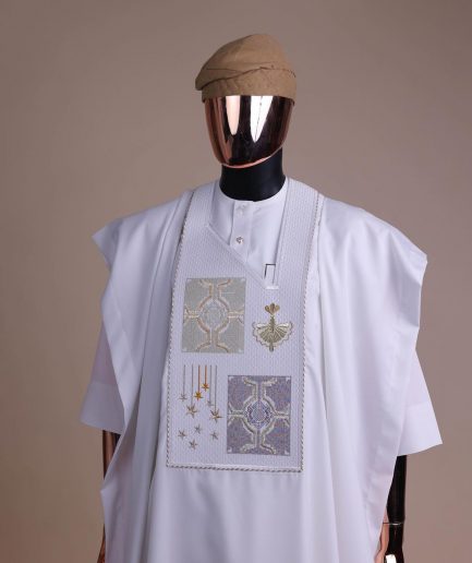 A white, dripping stars and interconnected maze embroidery details agbada