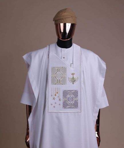 A white, dripping stars and interconnected maze embroidery details agbada
