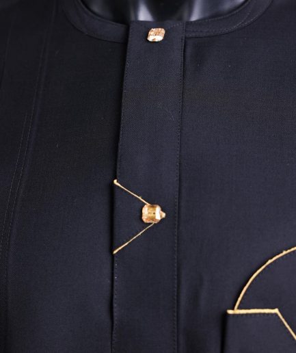 A charcoal black, inverted and closed flap shaped pocket details, 3/4 sleeve African senator kaftan native.