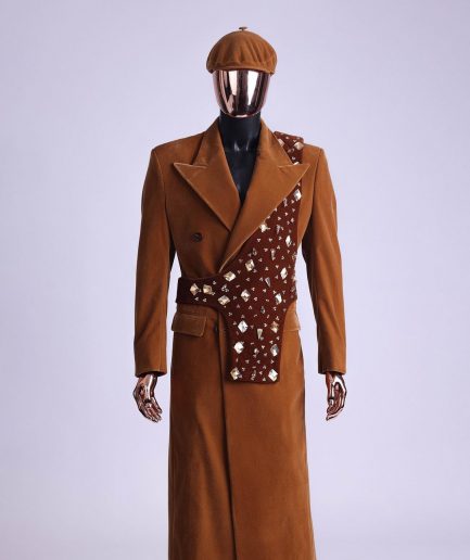 A Caramel brown, soaked velvet, peak lapel double breasted trench suit