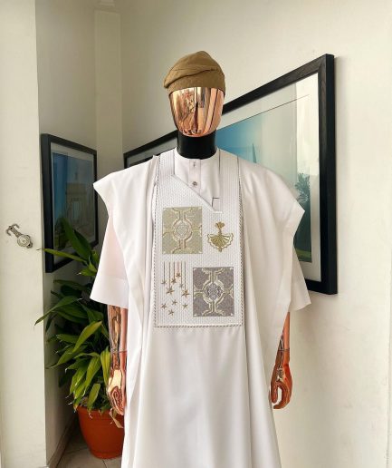 A white, dripping stars and interconnected maze embroidery details agbada