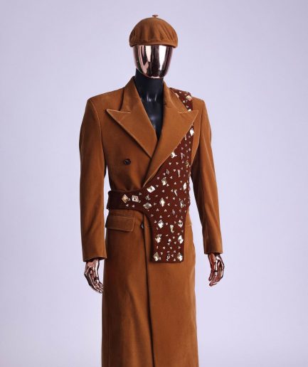 A Caramel brown, soaked velvet, peak lapel double breasted trench suit