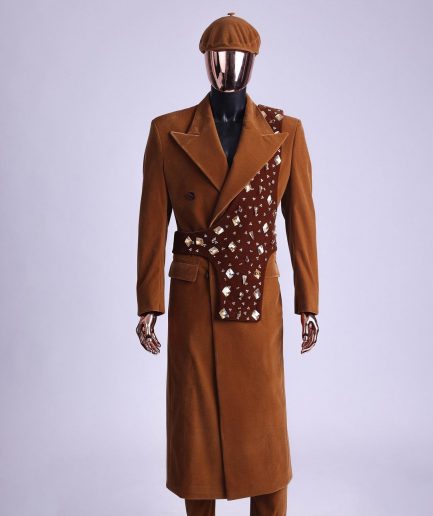 A Caramel brown, soaked velvet, peak lapel double breasted trench suit