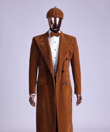 A Caramel brown, soaked velvet, peak lapel double breasted trench suit