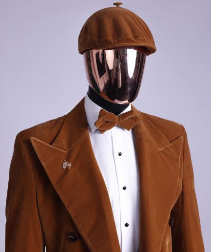 A Caramel brown, soaked velvet, peak lapel double breasted trench suit