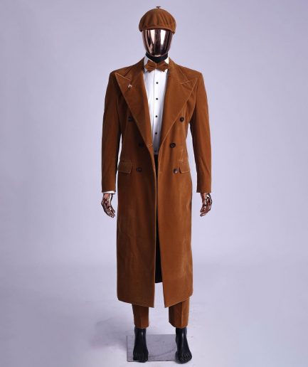 A Caramel brown, soaked velvet, peak lapel double breasted trench suit