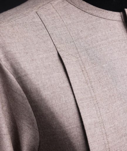 A Light cedar brown, Jorgecarli wool, front flap, layered suit & pen pocket, 3/4 sleeve and clear view silver Swarovski button African senator kaftan native.