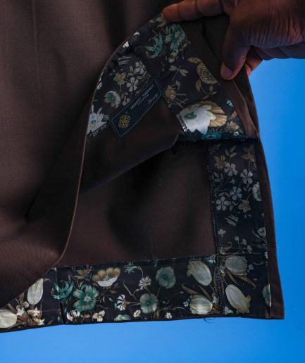 An Umber brown, Nobility fabric, front flap, short sleeve and gold details Swarovski button African senator kaftan native.
