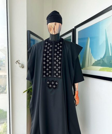 A charcoal black, grommet eyelet on dropping octa with silver Swarovski embroidery details agbada