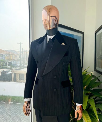 A Charcoal Black “Mandate” rain drop patterned jacquard, triple breasted, 2 layer dropping sache tuxedo suit.