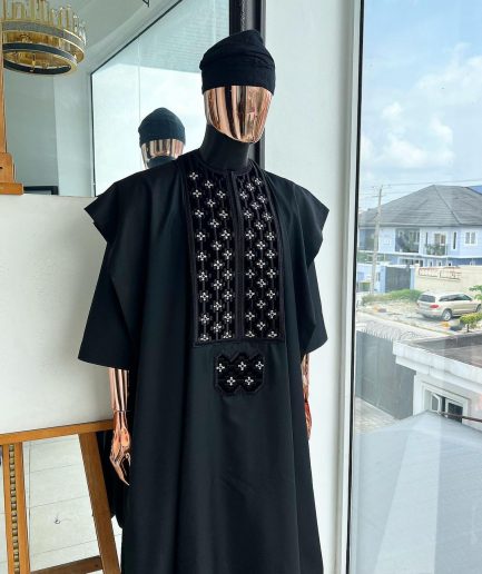 A charcoal black, grommet eyelet on dropping octa with silver Swarovski embroidery details agbada