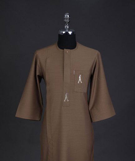 A Peanut brown, front flap, walking paul embroidery details, 3/4 sleeve African senator kaftan native.