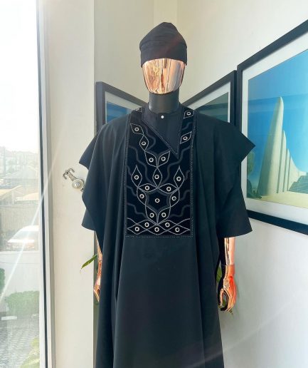 A charcoal black, grommet eyelet on root splash embroidery details agbada