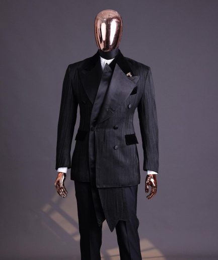 A Charcoal Black “Mandate” rain drop patterned jacquard, triple breasted, 2 layer dropping sache tuxedo suit.