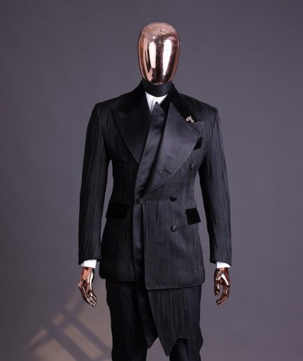 A Charcoal Black “Mandate” rain drop patterned jacquard, triple breasted, 2 layer dropping sache tuxedo suit.