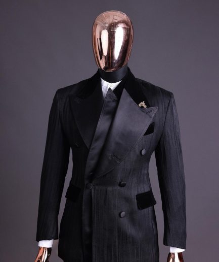 A Charcoal Black “Mandate” rain drop patterned jacquard, triple breasted, 2 layer dropping sache tuxedo suit.