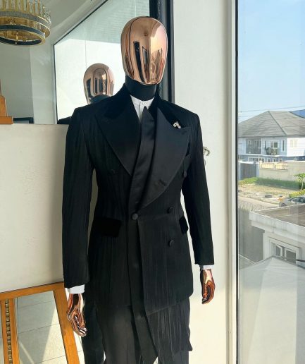 A Charcoal Black “Mandate” rain drop patterned jacquard, triple breasted, 2 layer dropping sache tuxedo suit.