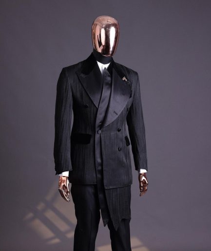 A Charcoal Black “Mandate” rain drop patterned jacquard, triple breasted, 2 layer dropping sache tuxedo suit.
