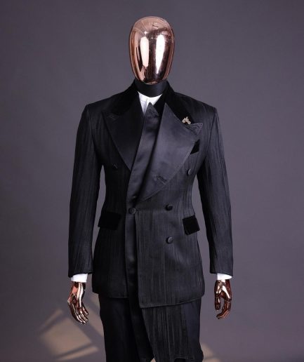 A Charcoal Black “Mandate” rain drop patterned jacquard, triple breasted, 2 layer dropping sache tuxedo suit.
