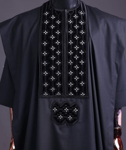 A charcoal black, grommet eyelet on dropping octa with silver Swarovski embroidery details agbada