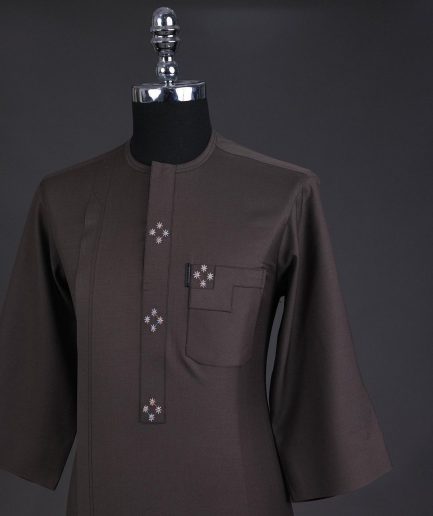An Uber brown, front flap with connected stars, 3/4 sleeve African senator kaftan native.