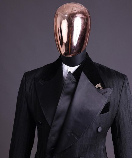 A Charcoal Black “Mandate” rain drop patterned jacquard, triple breasted, 2 layer dropping sache tuxedo suit.