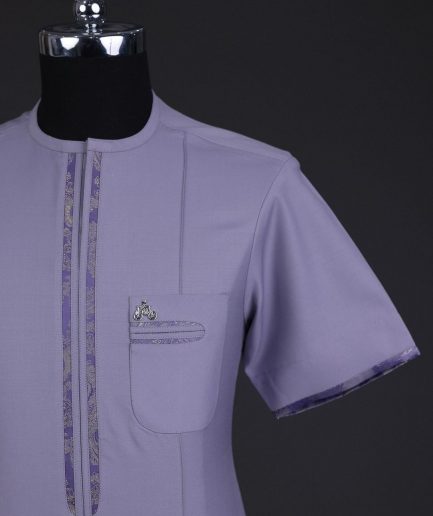 A periwinkle purple, zip line, paisley details, short sleeve African senator kaftan native.