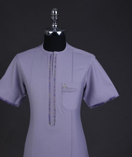 A periwinkle purple, zip line, paisley details, short sleeve African senator kaftan native.