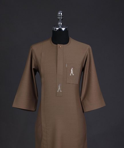A Peanut brown, front flap, walking paul embroidery details, 3/4 sleeve African senator kaftan native.