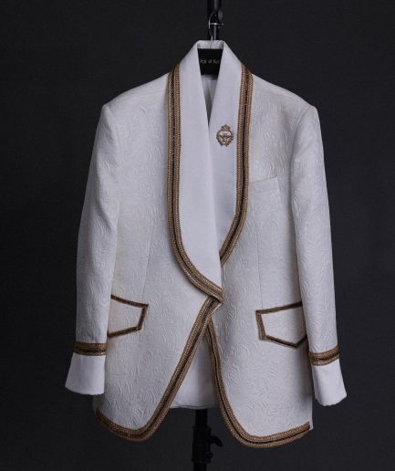 An ivory white floral Jacquard, gold trimmings, patch pocket shawl lapel tuxedo suit