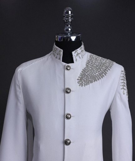 A white, hand “ide” silver metal wire embroidery, right hand sache safari suit