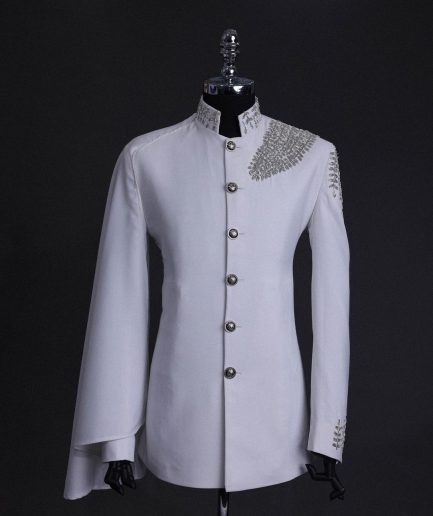 A white, hand “ide” silver metal wire embroidery, right hand sache safari suit