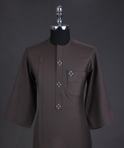 An Uber brown, front flap with connected stars, 3/4 sleeve African senator kaftan native.