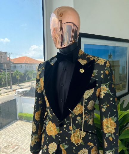 A Charcoal Black, Lemon Green, Orange Mix Metallic Floral Jacquard, Peak Lapel Tuxedo Suit.