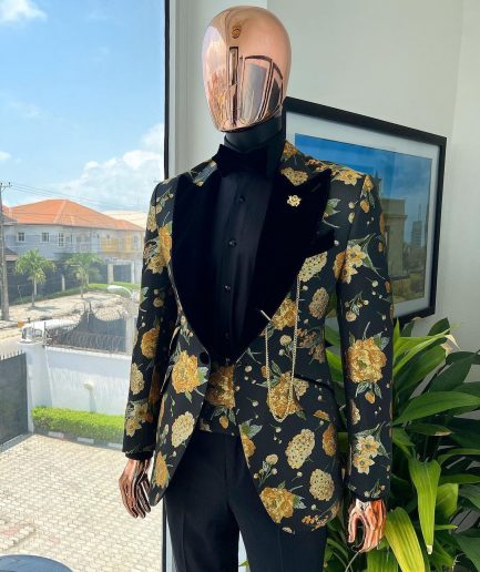 A Charcoal Black, Lemon Green, Orange Mix Metallic Floral Jacquard, Peak Lapel Tuxedo Suit.