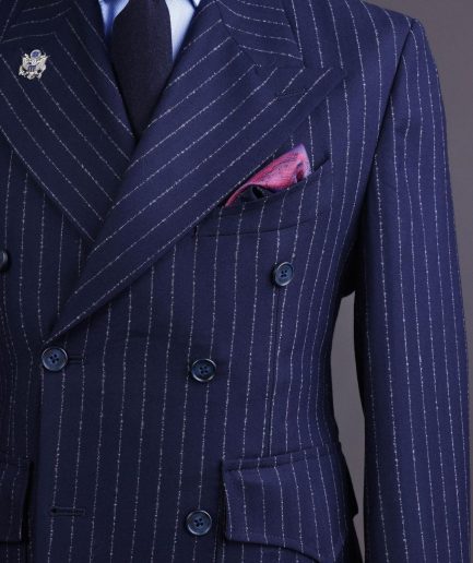 A Pencil stripe and navy blue – Jorgecarli - peak lapel double breasted suit