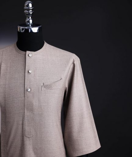 A Light cedar brown, Jorgecarli wool, front flap, layered suit & pen pocket, 3/4 sleeve and clear view silver Swarovski button African senator kaftan native.