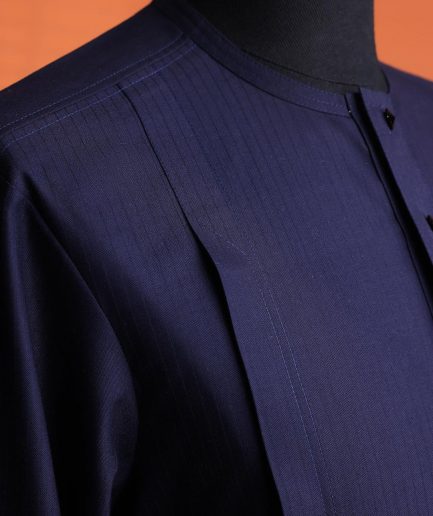 A Navy Blue, invisible pencil stripe, Jorgecarli wool, front flap, layered suit & pen pocket, 3/4 sleeve and clear view silver Swarovski button African senator kaftan native.