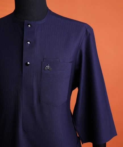 A Navy Blue, invisible pencil stripe, Jorgecarli wool, front flap, layered suit & pen pocket, 3/4 sleeve and clear view silver Swarovski button African senator kaftan native.