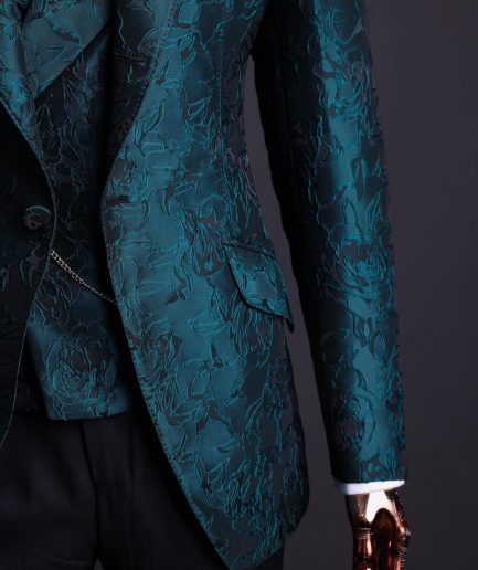 An emerald green, knitted, root floral jacquard notch lapel suit